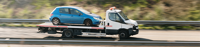 Carro a ser rebocado por Reboque de Assistência em Viagem